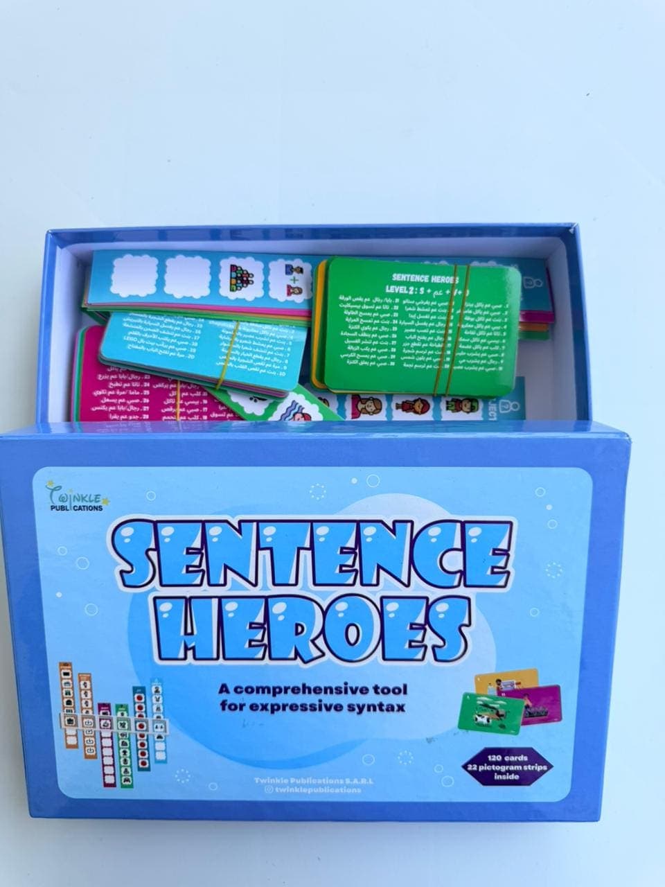 The Sentence Heroes box open, showing leveled cards and pictogram strips
